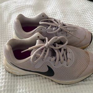 Nike Women’s Pale Pink Athletic Trainers with Black Swoosh